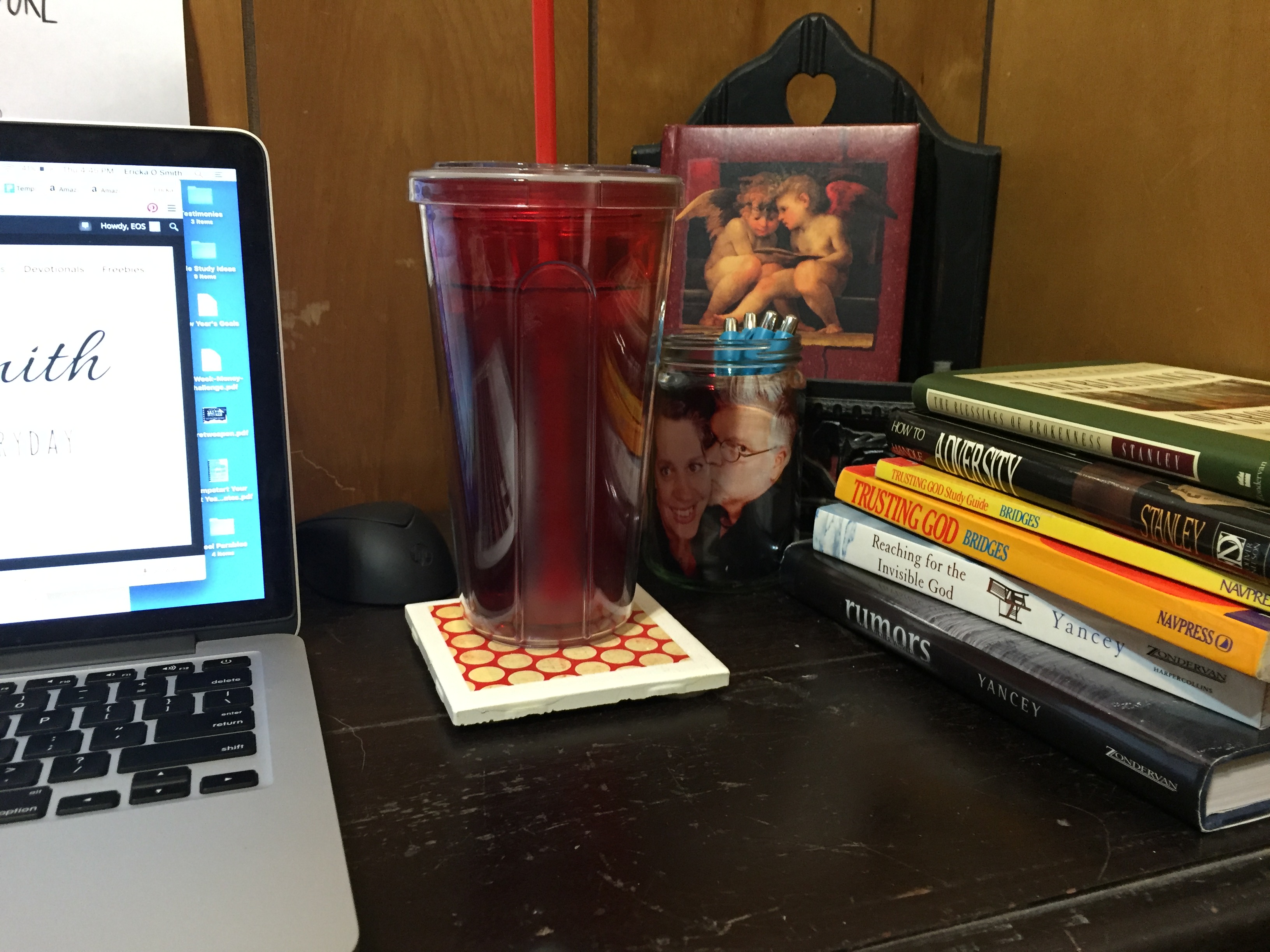 My desk during the Lenten season - a depository of books on brokenness.