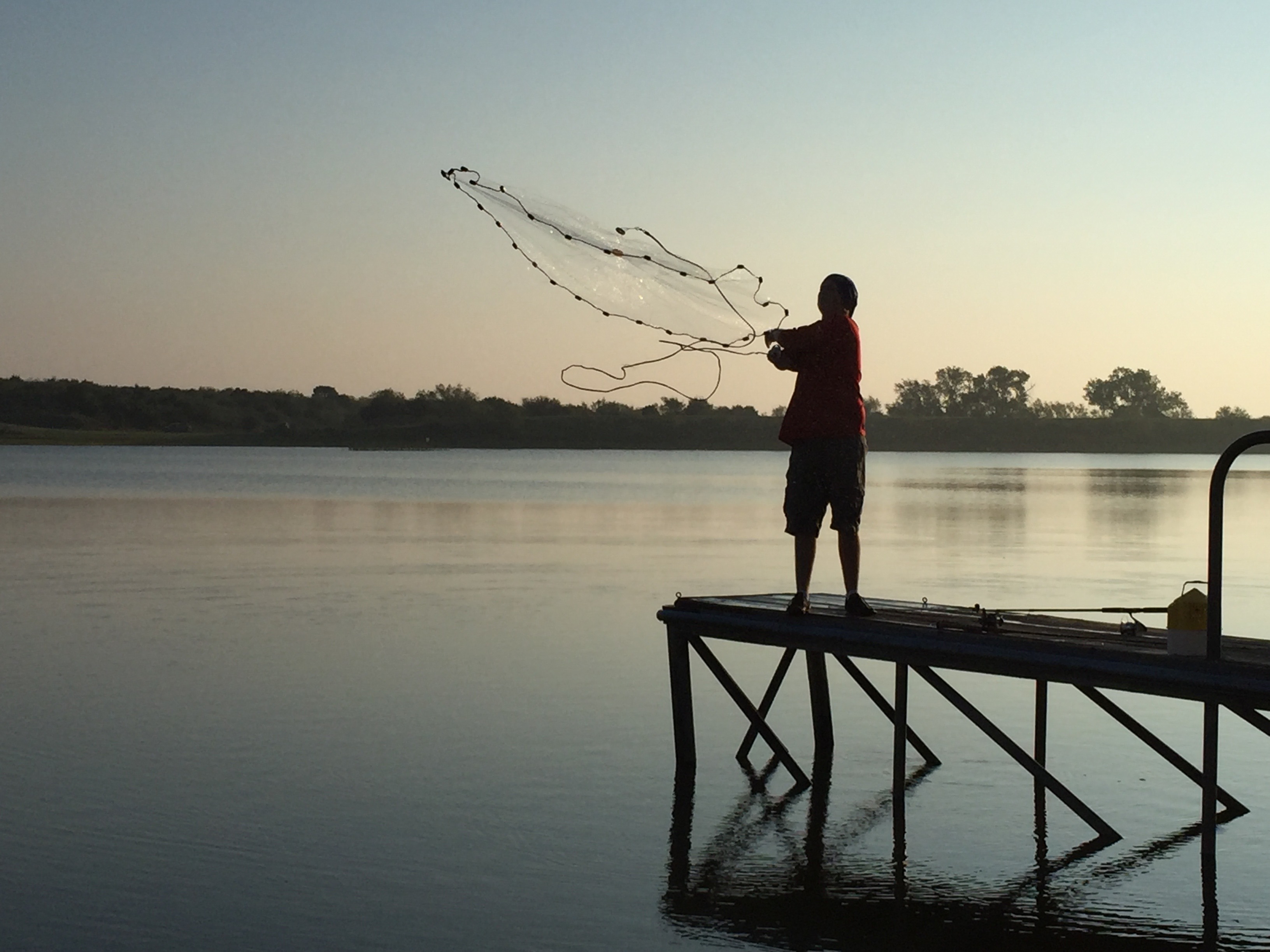 It was mesmerizing watching Jesse fish with his net for bait fish. I took wayyyyyy too many photos for a sane person, but come on...it's poetry in motion.